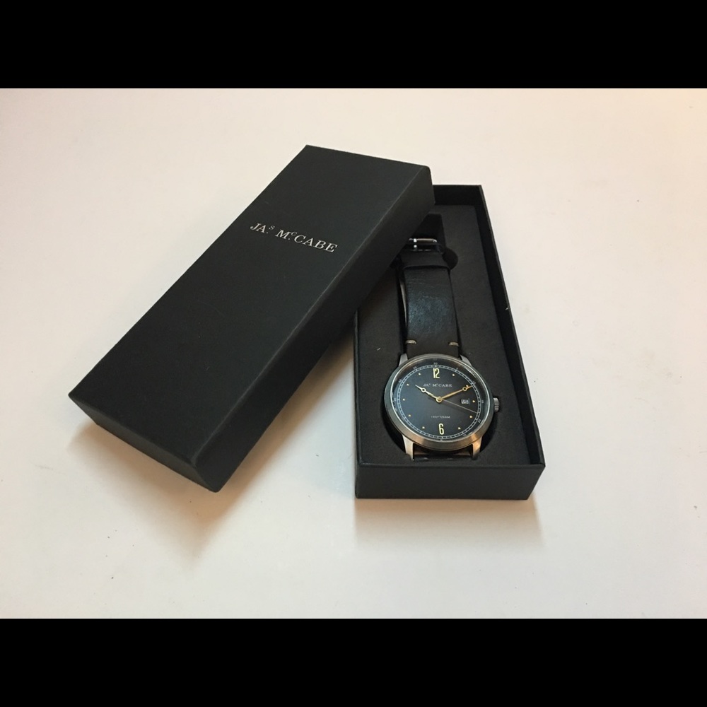 Men’s Black leather Ja.s Mc.Cabe Watch with box.